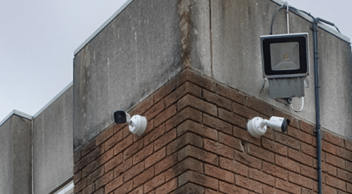 cctv attached to a wall