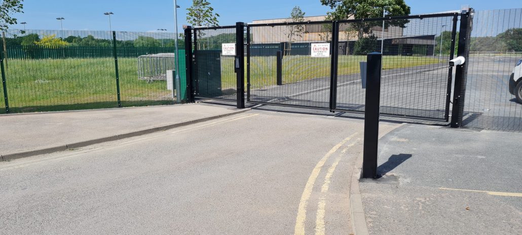 Access controlled Black automatic gate Unison